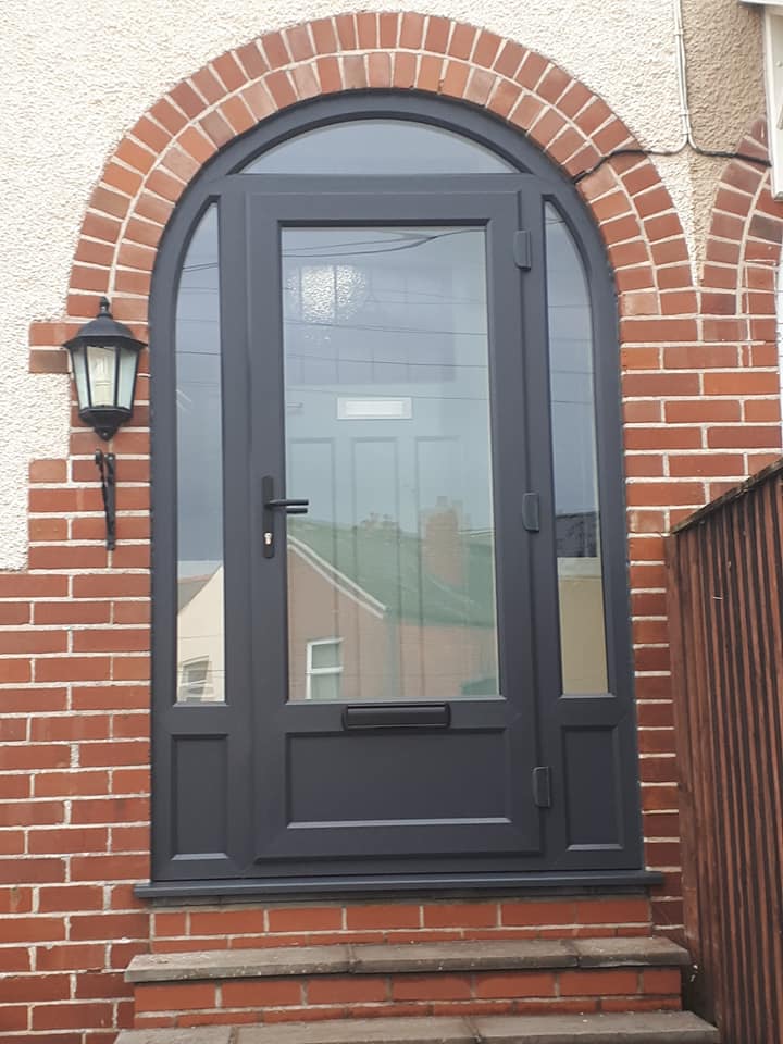 Stylish front door in brick arch