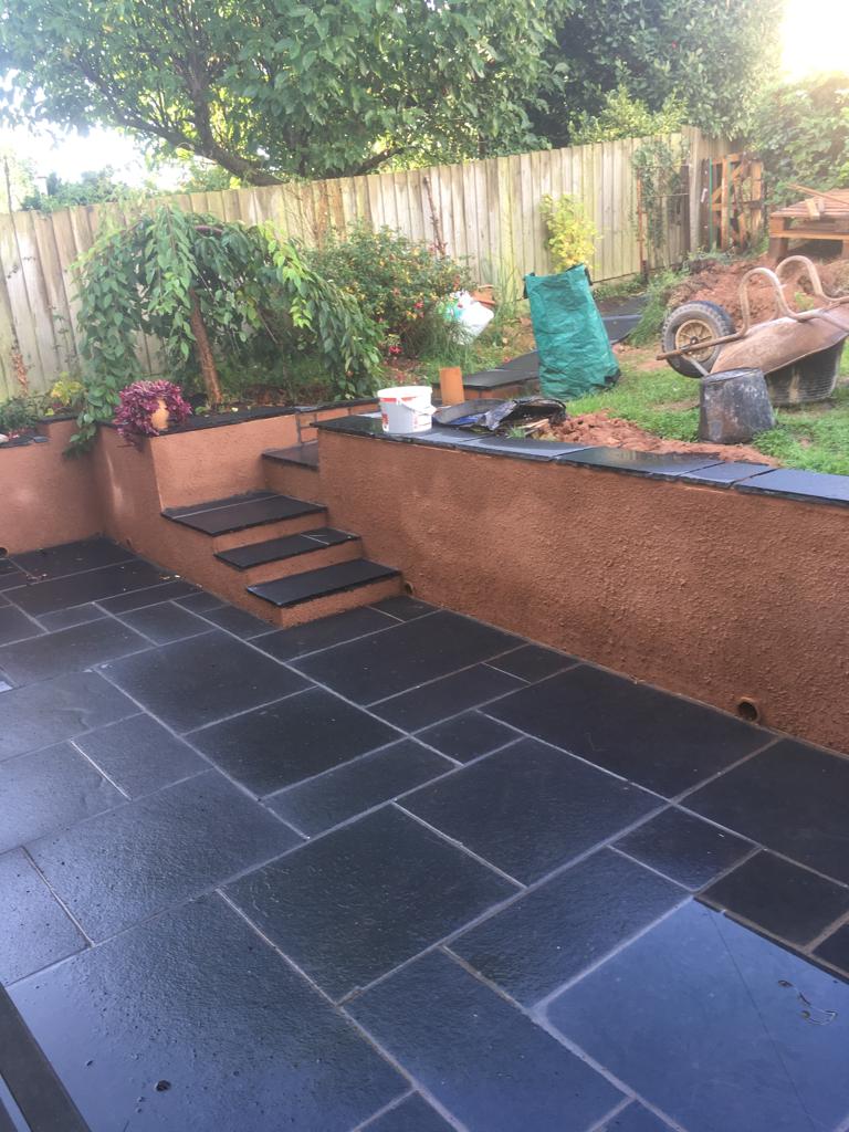 ebony slabs, garden retaining wall and steps.