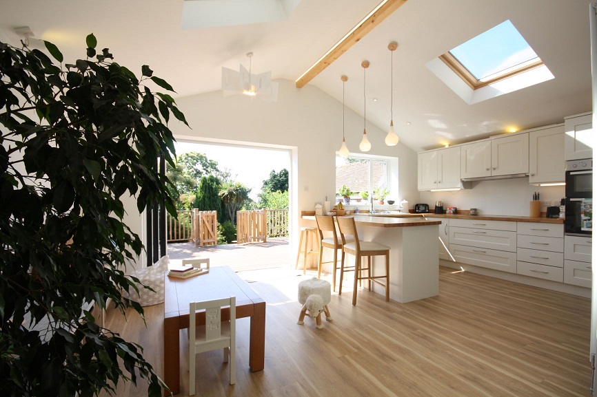 High ceiling kitchen diner/entertainment room