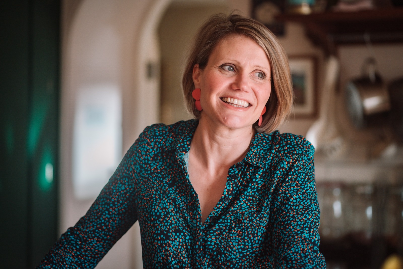 Smiling portrait of Lucy Yank, interior designer, Exeter.